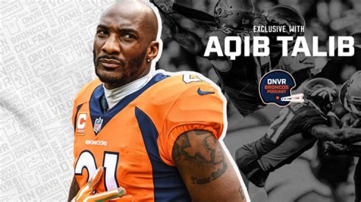 Aqib Talib is wearing a denim jacket with white tee and a chain.